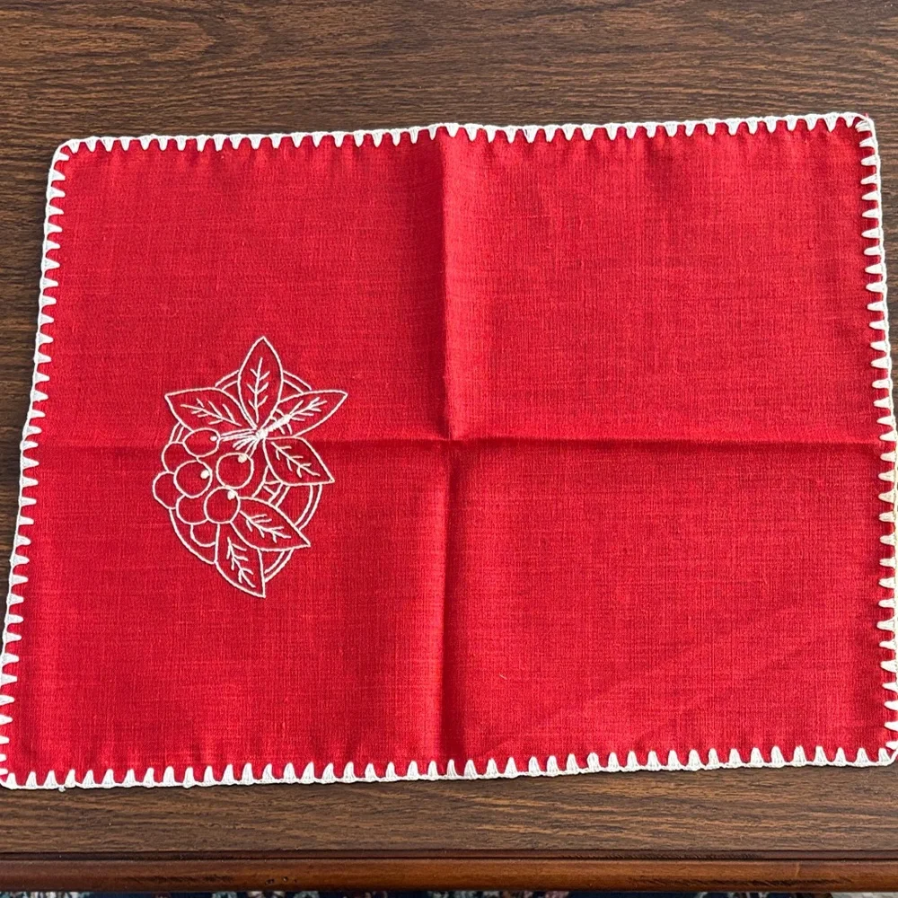 2 embroidered placemats